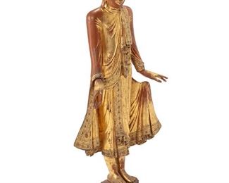 3176
A Giltwood Burmese Mandalay Buddha
19th Century
The carved giltwood standing figure depicting a youthful Buddha in elaborately folded robes trimmed with inset mirrored and glass jewels
51" H x 23.5" W x 11" D
Estimate: $1,000 - $2,000