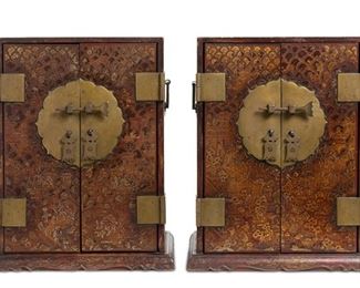 3179
A Pair Of Chinese Table-Top Cabinets
20th Century
Each red lacquered, double-door cabinet with gilt figural scenes and brass toggle lock and hardware, 2 pieces
Each: 18.5" H x 14.5" W x11.25" D
Estimate: $500 - $700