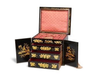 3178
A Chinoiserie Jewelry Chest
Late 19th/Early 20th century
The black lacquered box with gilt Chinoiserie decoration, with hinged top revealing a fitted interior and a double-door front opening to three drawers
9.75" H x 11.5" W x 9.25" D
Estimate: $800 - $1,200