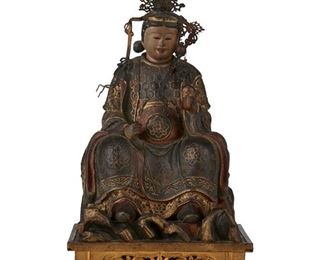 3182
A Chinese Carved Wood Seated Figure
Mid-19th Century or Earlier
Possibly depicting a war lord, with polychrome and gilt highlights finished with pierced metal head adornments
10" H x 5.75" W x 4" D
Estimate: $500 - $700