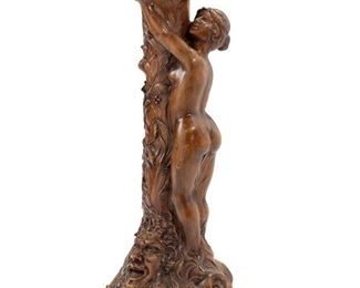 3188
An Art Nouveau Carved Wood Plant Stand
Late 19th/Early 20th Century
Signed L. Barthé
The carved wood stand depicting a nude woman clinging to a column covered in flowering vines over a mask of a satyr
40.5" H x 16" W x 15" D
Estimate: $1,000 - $1,500