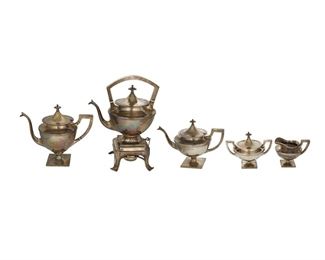 3192
An American Sterling Silver Tea And Coffee Service
First-Quarter 20th Century
Each marked for Shreve & Co. and sterling
Each with a banded waist, comprising a hot water tipping kettle (13.5"), a coffee pot (9.5"), a tea pot (8.25"), a covered sugar bowl (6.25), and a creamer (4.5"), 5 pieces
154.995 oz. troy approximately
Estimate: $1,800 - $2,200