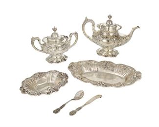 3193
A Group Of Reed & Barton "Francis I" Sterling Silver Table Items
Mid-20th Century
Each marked for Reed & Barton and sterling
Designed 1907 by Ernest Meyers, comprising a teapot (8.5"), a covered sugar bowl (6.75"), an oval serving dish (12"), a bon bon dish (7.5"), a butter spreader (5.875"), and a sugar shell spoon (5.375"), 6 pieces
82.59 oz. troy approximately
Estimate: $1,500 - $2,000
