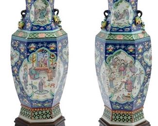 3205
A Pair Of Chinese Painted Porcelain Vases
Late 19th/Early 20th Century
Each baluster-form, white glazed porcelain vase with polychrome enamel painted figural medallions against a blue ground and mounted to a wood base, 2 pieces
Each: 27" H x 8.5" Dia.
Estimate: $3,000 - $4,000