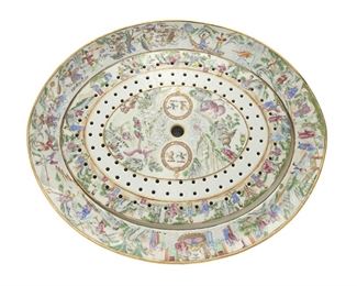 3207
A Chinese Rose Mandarin Porcelain Platter
19th Century
The famille rose porcelain platter and drainer with a Rose Mandarin pattern, gilt highlights, and polychrome enamel decoration centering a seal commemorating Henry VIII's 1513 victory at the Battle of the Spurs, surrounded by figural scenes
2.5" H x 18.5" W x 15.75" D
Estimate: $600 - $800