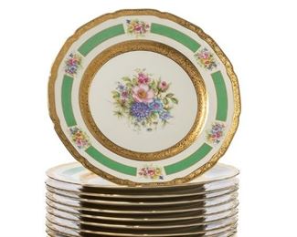 3211
A Set Of Bavarian Porcelain Dinner Plates, By Rosenthal
Mid-20th Century
Each with gilt backstamp for Rosenthal
Each glazed white porcelain centering a floral spray surrounded by an alternating rim of green bands and floral sprays, and with a gilt edge and cavetto, 12 pieces
Each: 10.625" Dia.
Estimate: $800 - $1,000
