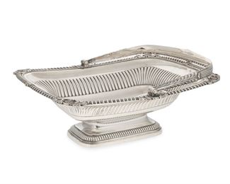 3221
A Victorian English Sterling Silver Bride's Basket
1832
Marked with English hallmarks for London; maker's mark for Rundell, Bridge & Rundell [IB under a crown]
The rectangular basket with gadrooned borders, rocaille motifs, and a bail-style handle raised on a pedestal base
11.25" H x 13.25" W x 11.25" D
48.315 oz. troy approximately
Estimate: $1,500 - $2,500