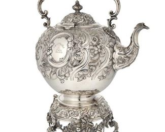 3223
A Victorian Scottish Sterling Silver Tipping Kettle
1864
Marked with Scottish hallmarks for Edinburgh; maker's mark for Marshall & Sons
The hot water tipping kettle with abundant repousse and chased flowers raised on a footed stand with burner
16" H x 10.5" W x 7.5" D
65.425 gross oz. troy approximately
Estimate: $1,500 - $2,000