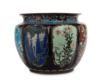 3255
A Large Japanese Cloisonné Jardinière
Fourth-Quarter 19th Century, Meiji Period (1868-1912)
The large enamel cloisonne vessel with repeating floral medallions on a cobalt blue ground
17.25" H x 21" Dia.
Estimate: $3,000 - $5,000