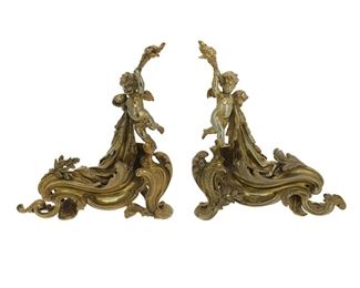 3285
A Pair Of French Louis XV-Style Chenets
Late 19th/Early 20th Century
Each impressed: 488
Each gilt-bronze chenet in the form of scrolled acanthus and rocailles surmounted by a putto, 2 pieces
Each: 16.5" H x 17" W x 6" D
Estimate: $300 - $500