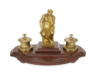 3290
A French Gilt-Bronze And Marble Inkwell
Fourth-Quarter 19th Century
The inkwell centering a gilt-bronze seated figure flanked by two wells and raised on a rouge marble base with pen holder
10" H x 15" W x 8.25" D
Estimate: $400 - $600