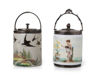 3314
Two Victorian Art Glass Biscuit Barrels
Late 19th/Early 20th Century
Each cylindrical, white Bristol glass jar with hand-painted decorations and fitted with a silver-plated lid and handle, comprising one depicting two children and pot of flowers (10" H x 5.25" Dia.) and one with a provincial cottage and swallows (9" H x 5" Dia.), 2 pieces
Estimate: $300 - $500