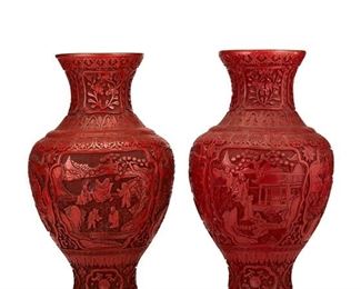 3319
A Pair Of Chinese Cinnabar Vases
Late 19th/Early 20th Century
Each with intaglio cut figural medallions surrounded by flowers and geometric borders, 2 pieces
18.75" H x 9.5" Dia.
Estimate: $800 - $1,200