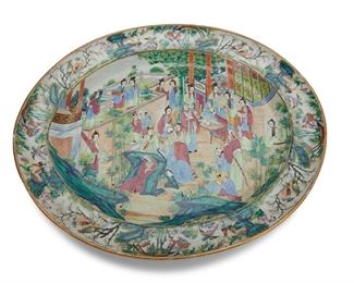 3320
A Chinese Rose Mandarin Porcelain Platter
19th Century
The famille rose porcelain platter with a Rose Mandarin pattern, gilt highlights, and polychrome enamel decoration centering a large figural scene surrounded by a border of birds and flowers
2.25" H x 21.25" W x 18.25" D
Estimate: $1,000 - $2,000