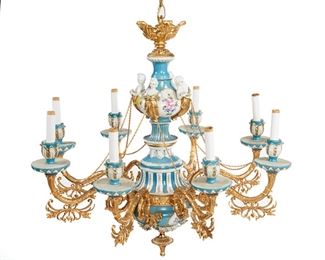 3336
A Sèvres-Style Gilt-Bronze Chandelier
Late 19th/Early 20th Century
The eight-light celeste blue porcelain chandelier dropping from an acanthus leaf top with gilt-bronze arms and mounts, electrified
27.5" H x 29" Dia.
Estimate: $1,000 - $2,000