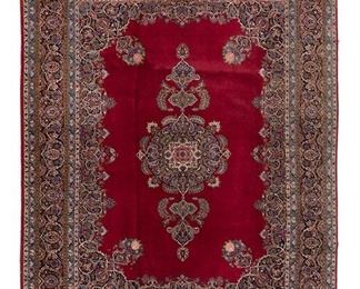 3345
A Kerman Wool Rug
Mid-20th Century
Wool on cotton foundation, open red field with central indigo floral medallion and spandrels within a major indigo border of palmettes and vinery
13'10" L x 10'7" W
Estimate: $1,000 - $1,500