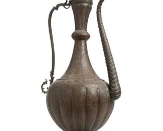 3347
A Large Bronze Turkish Lidded Ewer
20th Century
The large handled, lidded pot with elaborate foliate designs and a figural spout
39" H x 17" W x 13" D
Estimate: $600 - $800