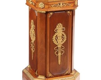 3351
A French Neoclassical-Style Pedestal Stand
First-Quarter 20th Century
Square form mahogany stand with canted corners, gilt-bronze mounts, and rosette pateras
31.5" H x 16.75" W x 16.75" D
Estimate: $600 - $800