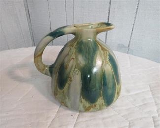 glazed pottery pitcher