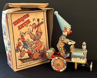 Unique Vintage 1950's Artie Clown Crazy Car Vintage Wind Up Tin Litho Toy
Unique Vintage 1950's Artie Vintage Wind Up Tin Litho Clown. A rare version of this clown with his ears in place! Comes with the box which has some wear.