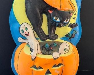 Vintage Light Up Decorative Halloween Sign in working condition with some wear including some color loss and slight denting/cracking of the plastic. Measures 21" h x 12" w