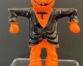 Vintage Hard Plastic Jack O Lantern Candy Container in good condition.