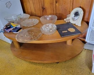 Rolling kidney shaped coffee table