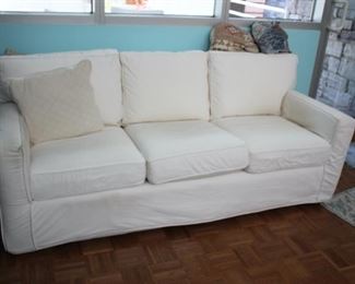 Slip covered sofa