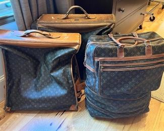 * Louis Vuitton Luggage- Garment Bag and Rare Expandable Duffle with Wheels.