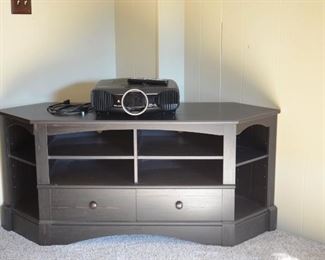 Black wooden corner media stand.  Projector TV. 