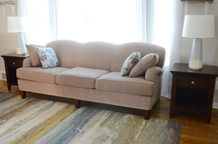 Three cushion couch with matching chair and ottoman.  Sold as a three piece set.  