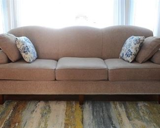 Three cushion couch with matching chair and ottoman.  Sold as a three piece set.  