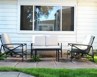 Patio furniture set includes love seat, 2 chairs and table.