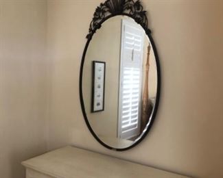 Oval scroll beveled mirror
