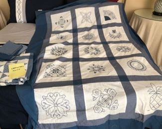 Hand stitched and embroidered quilt unfinished.