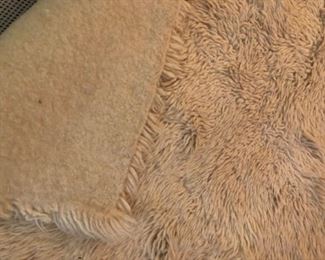 Flannel backed fur bedside rug