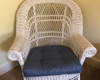 Wicker scroll arm chair and matching ottoman 