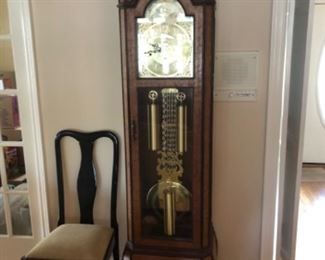 Fabulous grandfather clock, custom made in Taiwan in the early seventies.  Brought to the states by the owner.  It  is made of birds eye maple, with attention to every detail.  Three different chimes, on the 1/4, 1/2 or full hour.  Recently serviced, in perfect working condition.  