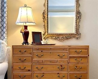 Gorgeous Georgian Pine 17 Drawer Dresser 
Locking with key 
Gold Leaf Beveled glass Mirror 