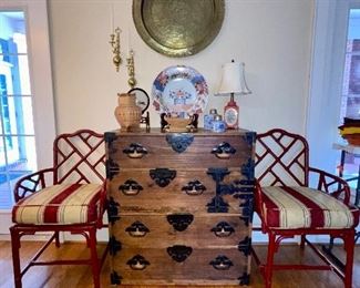 Antique Tansu Chest with Iron side arms, comes apart in 2 pieces. 
2 Chippendale Rattan chairs 