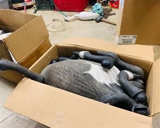 two boxes  of unused  duck  decoys