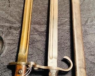 Two early bayonets including a WW 1 English Wilkinson bayonet and a 
WW 2 Japanese Tokyo arsenal bayonet 