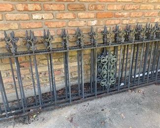 Large expanse of wrought iron fencing. 