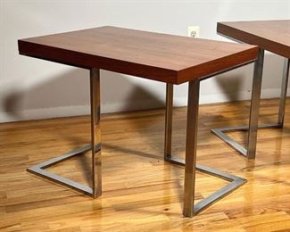 PAIR TEAK & CHROME SIDE TABLES | Mid-century modern end tables, with teak or rosewood veneer tops over chrome open frames, one with Maby label the other with different paper label - h. 22 x 30 x 20 in.