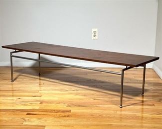 MID-CENTURY FLOATING LOW TABLE | Rosewood veneer over brushed steel frame, mid-century modern coffee table in the manner of Gio ponti, with a single piece wood top "floating" on a tubular metal frame - h. 13 x 56 x 16-1/2 in.