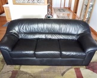 Black leather sofa