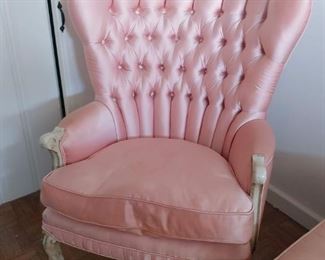 Pink tufted chair
