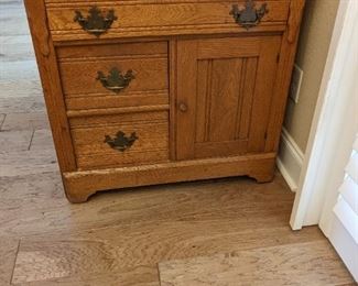 Antique tile topped cabinet