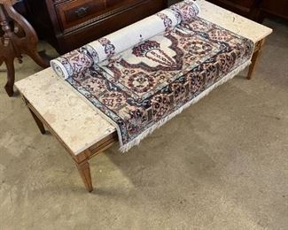 Mid-century coffee table and vintage handmade rug