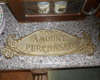 Antique cash register sign